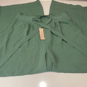 BCBGeneration Mint Green Wide-Leg Jumpsuit with Cross-Front Detail